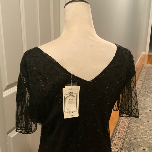 NWOT Ladies roaring 20’s era dress in black. Black sequins and fringe. Size XL - Picture 4 of 7